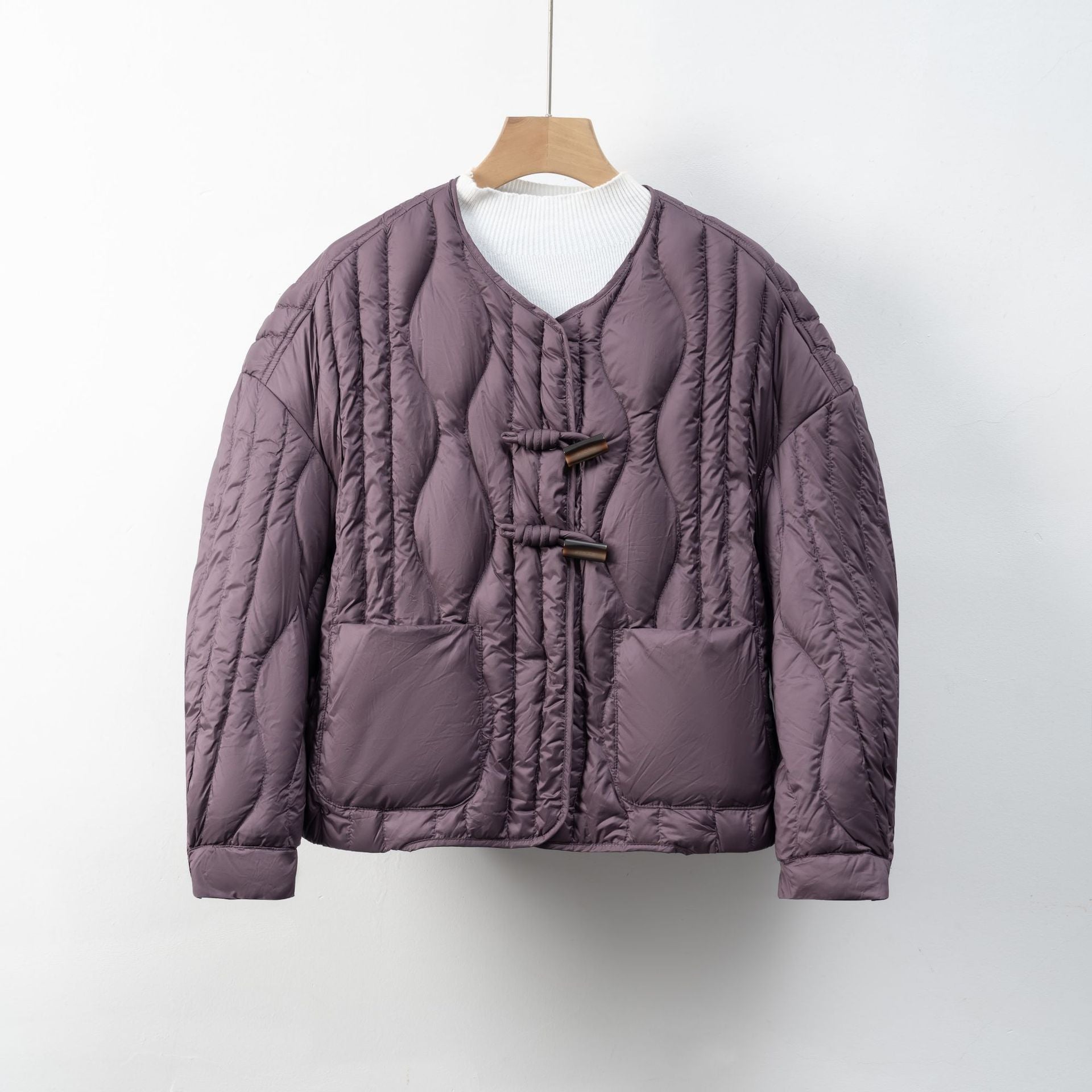Damen Steppjacke mit Knopfverschluss | Warme Winterjacke 0