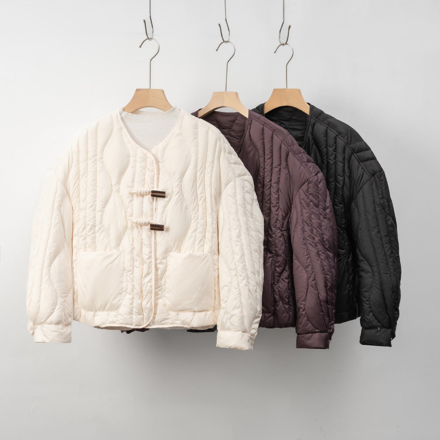 Damen Steppjacke mit Knopfverschluss | Warme Winterjacke 2