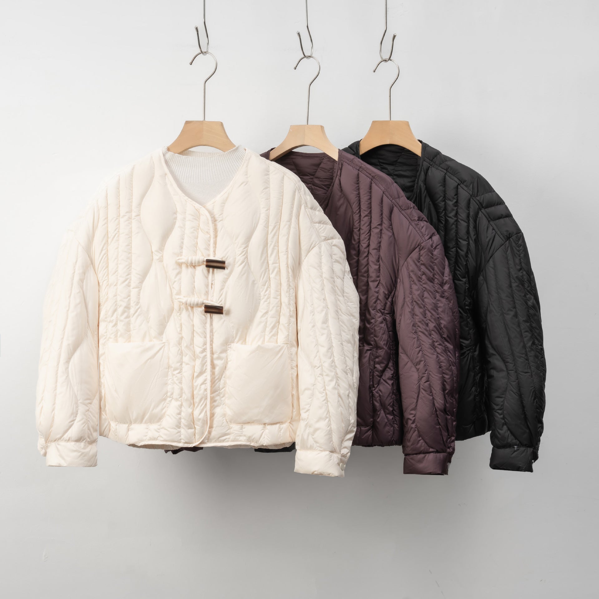 Damen Steppjacke mit Knopfverschluss | Warme Winterjacke 2