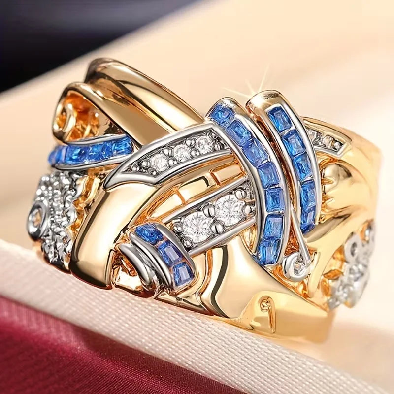 Selene | Breiter Blumenring mit blauem Zirkonia 1